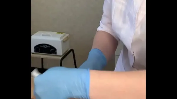 Show The patient CUM powerfully during the examination procedure in the doctor's hands fresh Videos